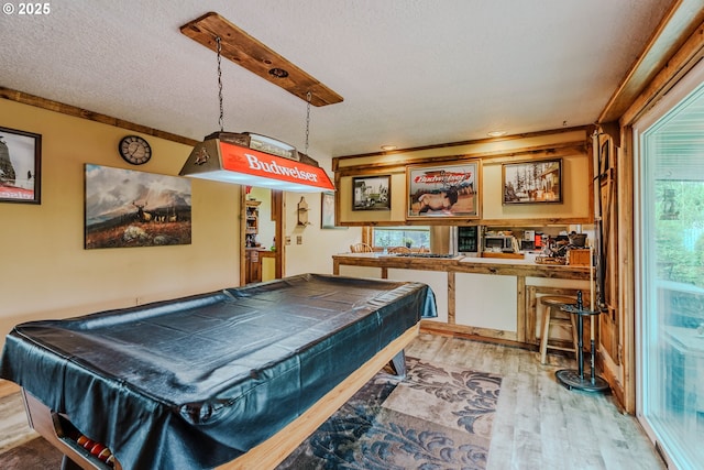 1445 NE 17th St, Gresham, OR 97030 - game room featuring wood finished floors, a textured ceiling, and billiards
