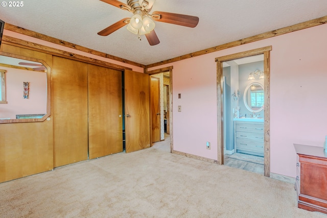 1445 NE 17th St, Gresham, OR 97030 - unfurnished bedroom with carpet, a closet, connected bathroom, and a ceiling fan