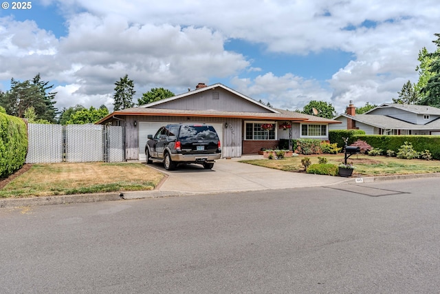1445 NE 17th St, Gresham, OR 97030 - ranch-style house featuring a garage, driveway, a chimney, and brick siding