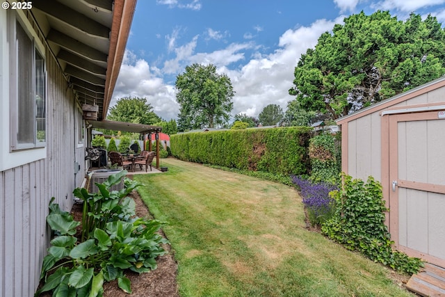 1445 NE 17th St, Gresham, OR 97030 - fenced backyard with a storage unit and a patio