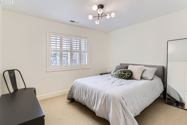 18350 SW Florendo Ln, Beaverton, OR 97007 - carpeted bedroom with visible vents, baseboards, and a chandelier