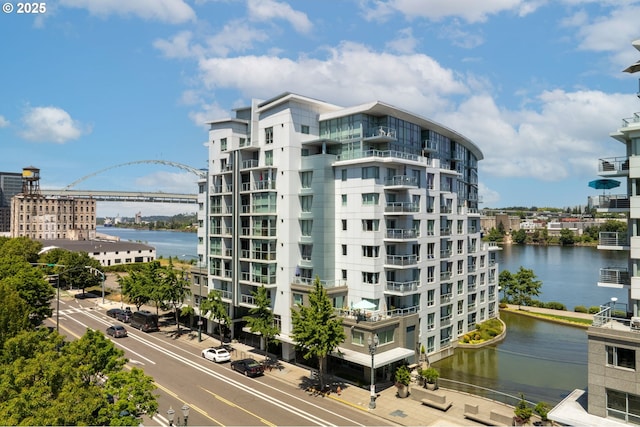 1310 NW Naito Pkwy, Portland, OR 97209 - view of apartment building / complex featuring a water view