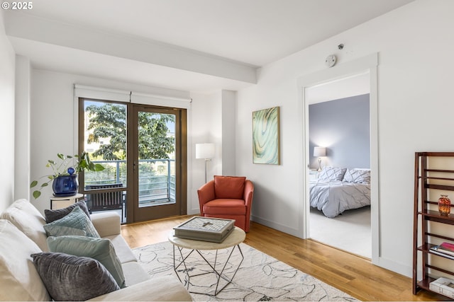 1310 NW Naito Pkwy, Portland, OR 97209 - living area with light wood-style floors and baseboards