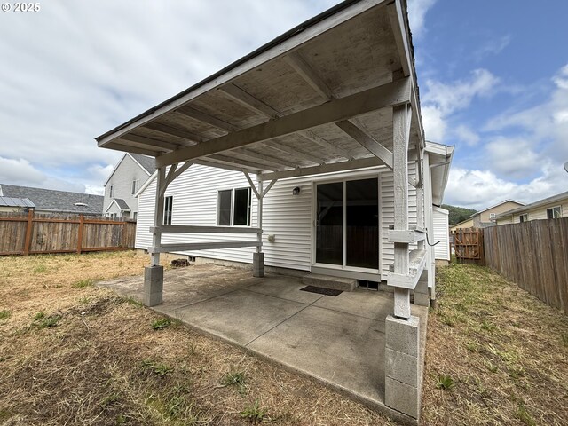 539 NW Blair Loop, Sheridan, OR 97378 - rear view of house featuring a patio area, a fenced backyard, and entry steps