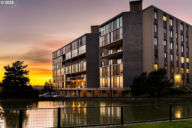 outdoor building at dusk with a water view