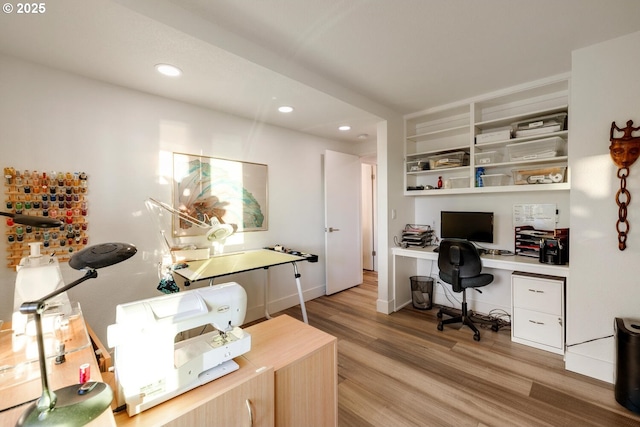 home office featuring light hardwood / wood-style floors