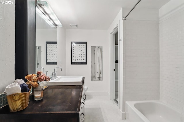 bathroom featuring toilet, baseboards, visible vents, tile patterned floors, and vanity