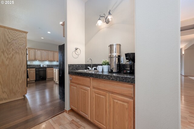 14788 S Burkstrom Rd, Oregon City, OR 97045 - kitchen with a sink, dishwasher, wood finished floors, dark countertops, and recessed lighting
