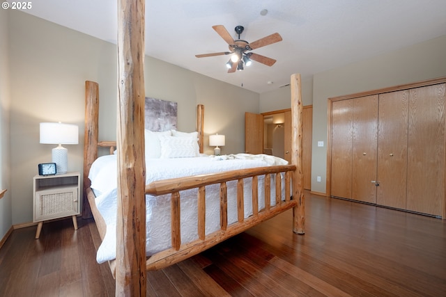 bedroom featuring dark wood-type flooring, a closet, and ceiling fan