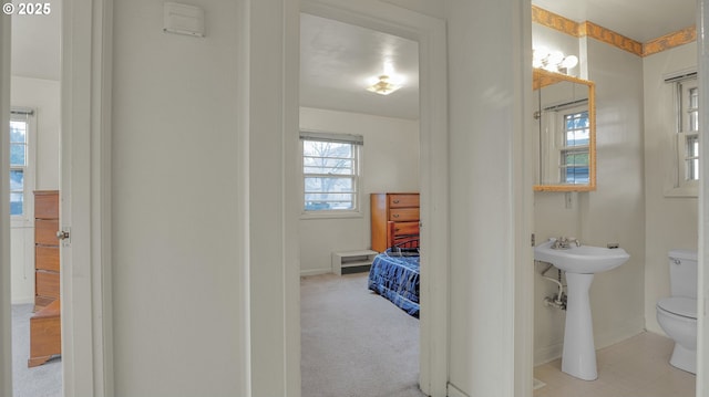 bathroom with toilet and sink