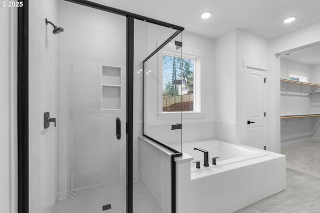 bathroom with independent shower and bath