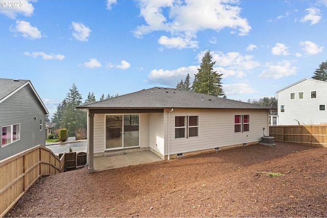 rear view of property featuring central AC and a patio