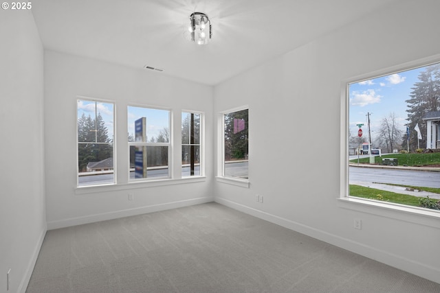 empty room with carpet flooring