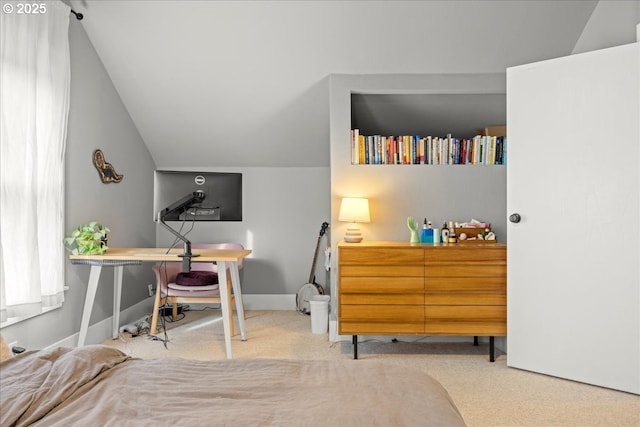 carpeted bedroom featuring vaulted ceiling