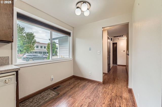 617 NW Fariss Rd, Gresham, OR 97030 - unfurnished dining area featuring wood finished floors and baseboards