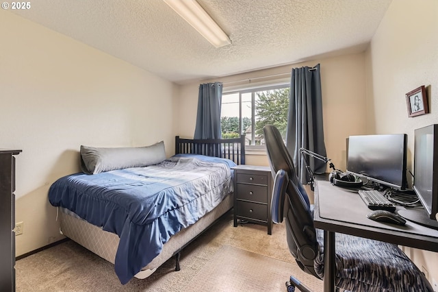 617 NW Fariss Rd, Gresham, OR 97030 - bedroom featuring light colored carpet, a textured ceiling, and a desk