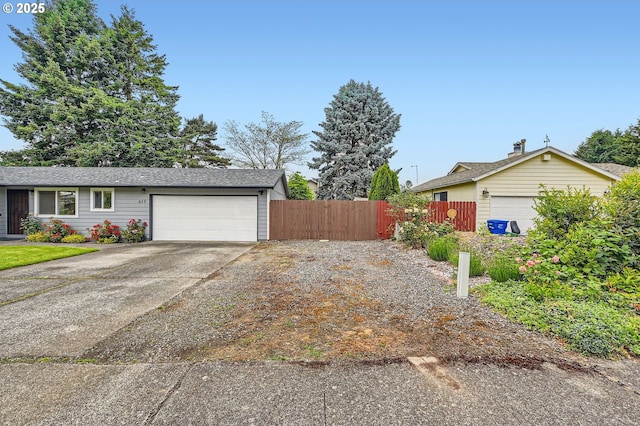 617 NW Fariss Rd, Gresham, OR 97030 - view of home's exterior with an attached garage and concrete driveway