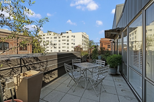 1240 NW Hoyt St Unit 6, Portland, OR 97209 - view of patio with a balcony