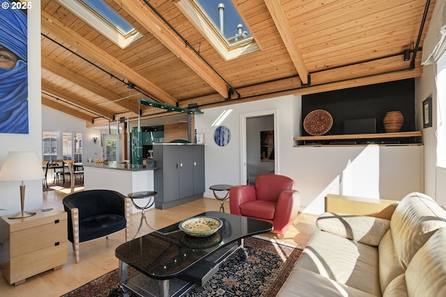 1240 NW Hoyt St Unit 6, Portland, OR 97209 - living room featuring wooden ceiling, wood finished floors, and vaulted ceiling with skylight