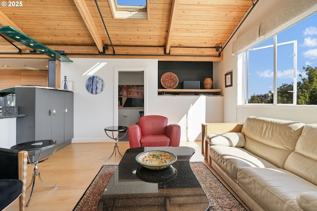 1240 NW Hoyt St Unit 6, Portland, OR 97209 - living room featuring wood ceiling, baseboards, vaulted ceiling with beams, and wood finished floors