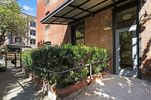 1240 NW Hoyt St Unit 6, Portland, OR 97209 - entrance to property with a gate and brick siding