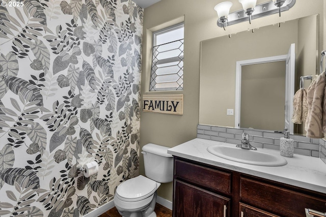 802 NW Green Forest Cir, Redmond, OR 97756 - bathroom with vanity and decorative backsplash
