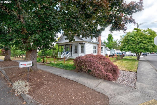 589 NW 3rd Ave, Canby, OR 97013 - view of front of property with a porch