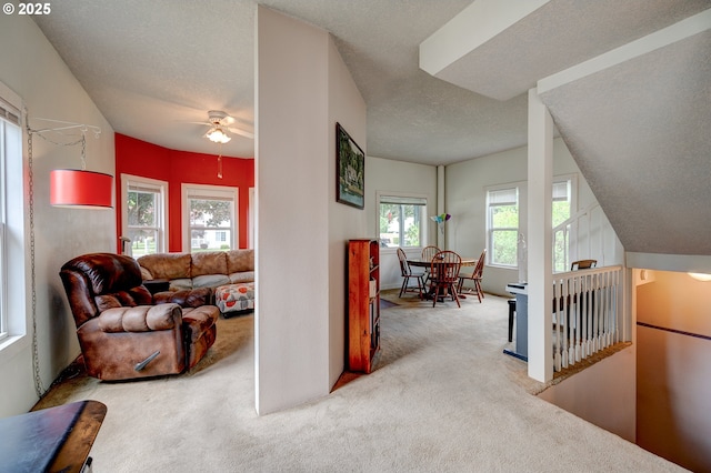 589 NW 3rd Ave, Canby, OR 97013 - hallway with carpet, a textured ceiling, and an upstairs landing