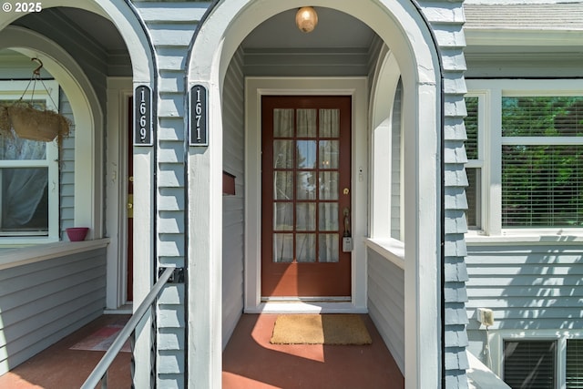 property entrance with covered porch