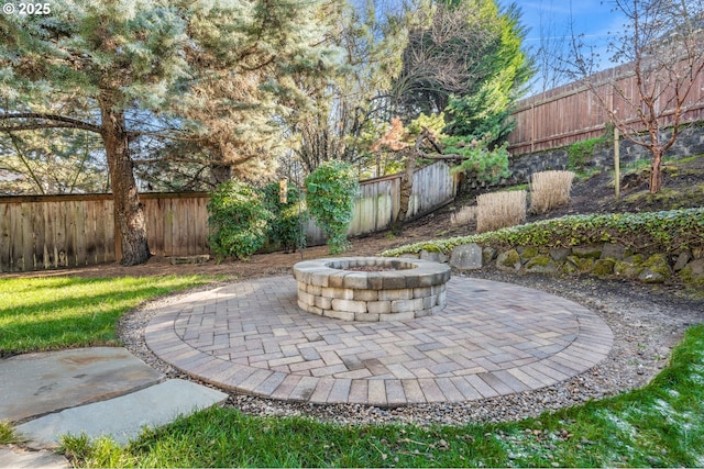 view of yard featuring a patio area and a fire pit