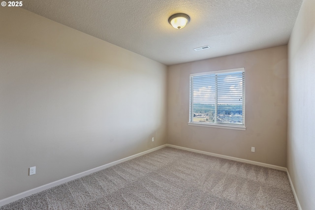 1455 NE Cooper Ln, Estacada, OR 97023 - unfurnished room with baseboards, visible vents, carpet flooring, and a textured ceiling