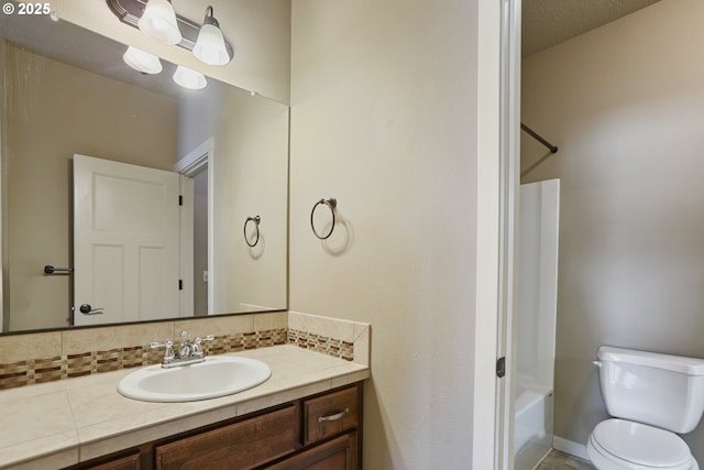 1455 NE Cooper Ln, Estacada, OR 97023 - full bathroom featuring toilet, vanity, shower / tub combination, tasteful backsplash, and baseboards