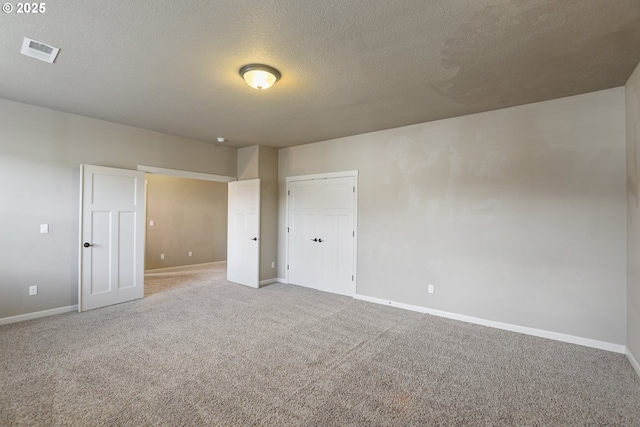 1455 NE Cooper Ln, Estacada, OR 97023 - spare room with light carpet, baseboards, and visible vents