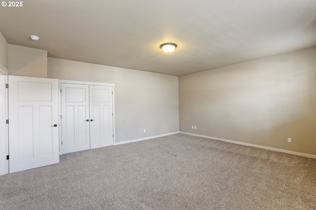 1455 NE Cooper Ln, Estacada, OR 97023 - unfurnished bedroom featuring carpet flooring, baseboards, and a closet