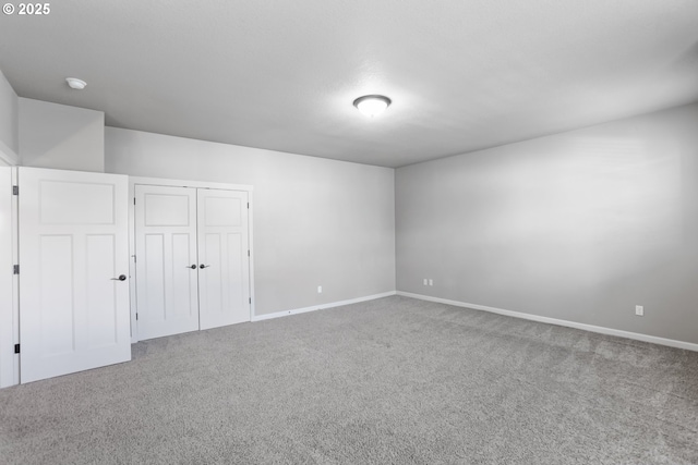 1455 NE Cooper Ln, Estacada, OR 97023 - unfurnished bedroom featuring carpet, baseboards, and a closet