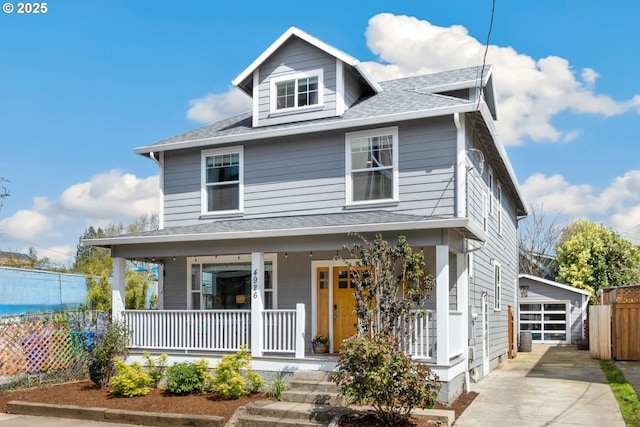 4926 NE 12th Ave, Portland, OR 97211 - traditional style home with a porch, an outdoor structure, a shingled roof, and a detached garage