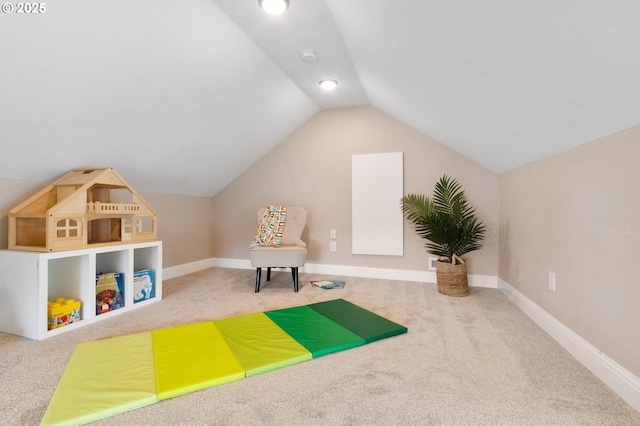 4926 NE 12th Ave, Portland, OR 97211 - recreation room featuring carpet, vaulted ceiling, and baseboards
