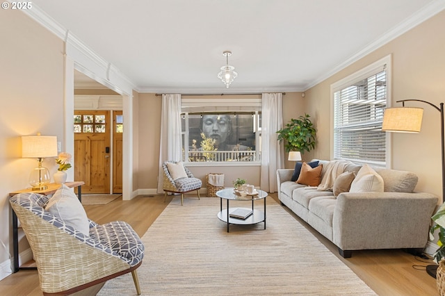 4926 NE 12th Ave, Portland, OR 97211 - living area featuring ornamental molding, wood finished floors, and baseboards