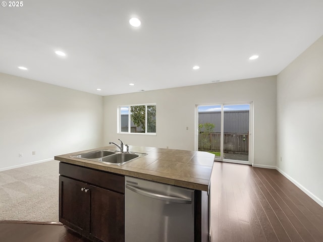 10095 NW Curtis St, North Plains, OR 97133 - kitchen featuring stainless steel dishwasher, a sink, baseboards, recessed lighting, and tile counters