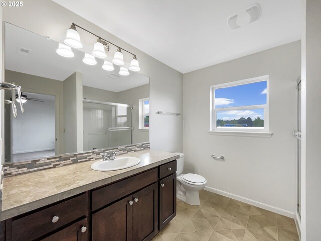 10095 NW Curtis St, North Plains, OR 97133 - full bathroom with a stall shower, vanity, plenty of natural light, and toilet