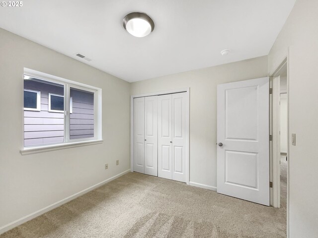 10095 NW Curtis St, North Plains, OR 97133 - unfurnished bedroom with carpet, baseboards, and a closet
