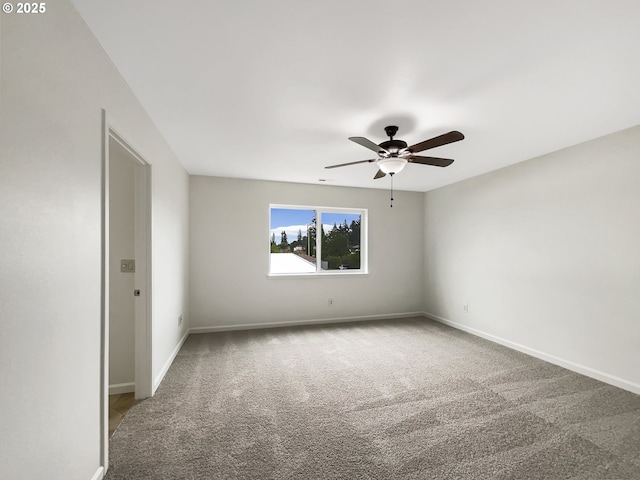 10095 NW Curtis St, North Plains, OR 97133 - empty room with carpet flooring, a ceiling fan, and baseboards