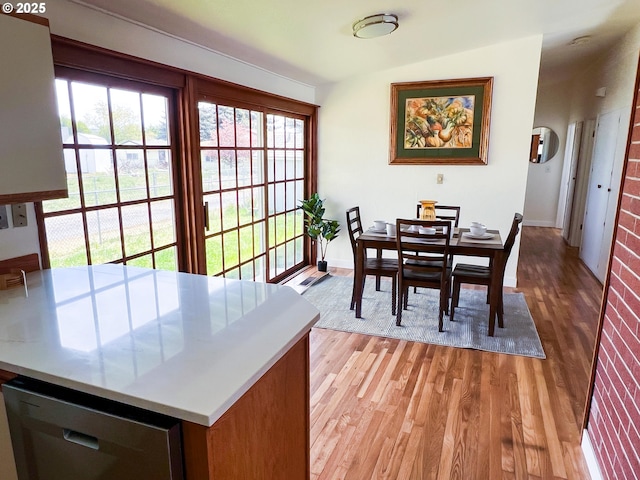 1214 NE Loper Ave, Prineville, OR 97754 - dining room with light wood-style floors and baseboards