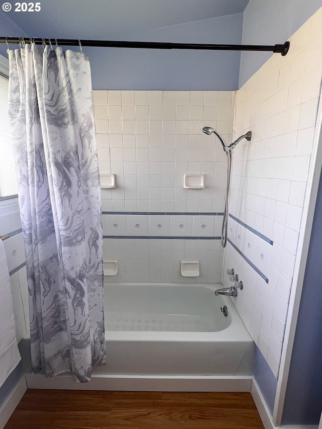 1214 NE Loper Ave, Prineville, OR 97754 - full bath with wood finished floors, shower / bath combination with curtain, and baseboards