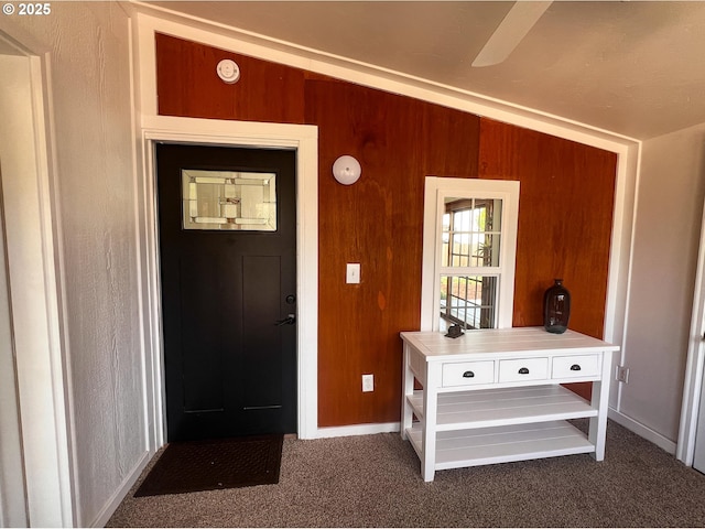 1214 NE Loper Ave, Prineville, OR 97754 - carpeted entrance foyer with baseboards and wooden walls