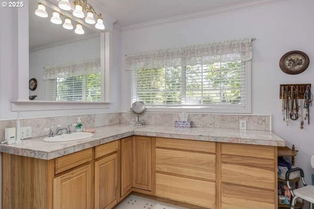 22885 S Tendril Ln, West Linn, OR 97068 - kitchen with crown molding, a sink, and decorative backsplash