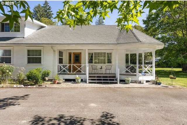22885 S Tendril Ln, West Linn, OR 97068 - view of front of home with covered porch and roof with shingles