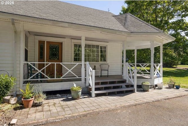 22885 S Tendril Ln, West Linn, OR 97068 - doorway to property with a shingled roof and covered porch