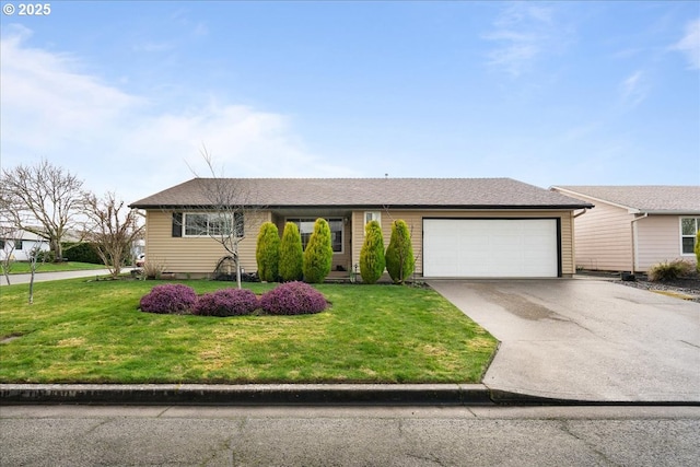 view of front of property with a garage, driveway, and a front lawn