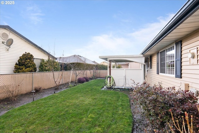 view of yard with a fenced backyard